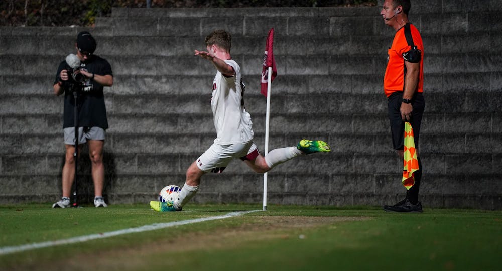Redshirt sophomore midfielder Jack Burgess lines up a corner kick during South Carolina's' match against Costal Carolina on Oct. 27, 2023. The Gamecocks defeated the Chanticleers 4-3 at Stone Stadium, picking up the 5th win of the season.