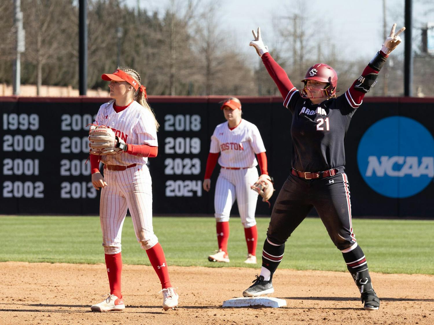 Redshirt junior Natalie Heath flashes two peace signs after reaching second base during South Carolina's game against Boston University at Carolina Softball Stadium on Feb. 22, 2025. Heath recorded one hit in the game.