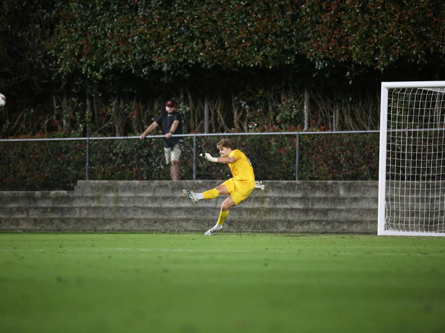 Redshirt senior goalkeeper Brant Zulauf clears the ball after making a save. Zulauf had five saves during the game against the Jacksonville Dolphins on Oct. 3, 2023.