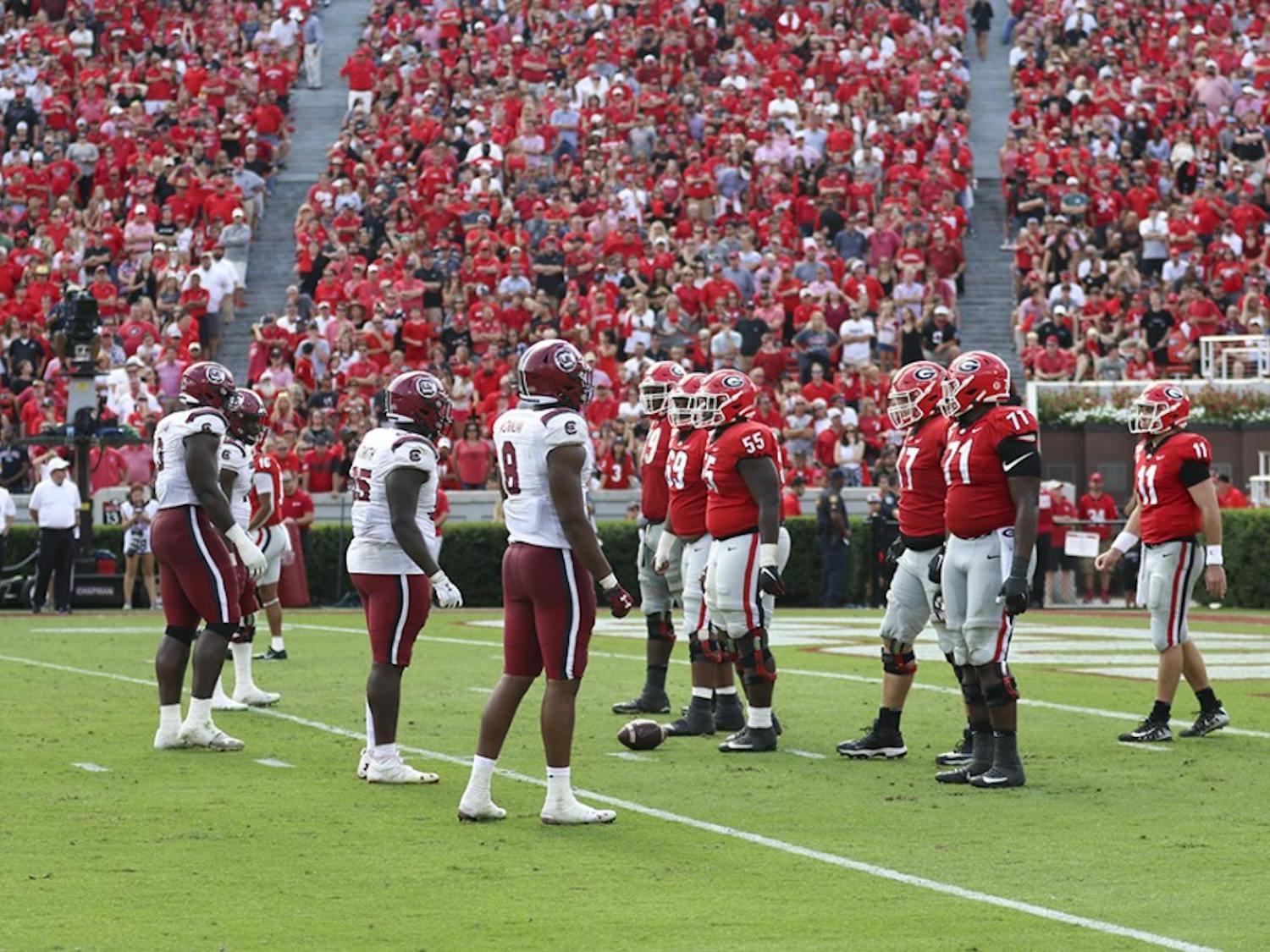 The Gamecocks prepare for a play against UGA during the game in Athens Oct. 12.