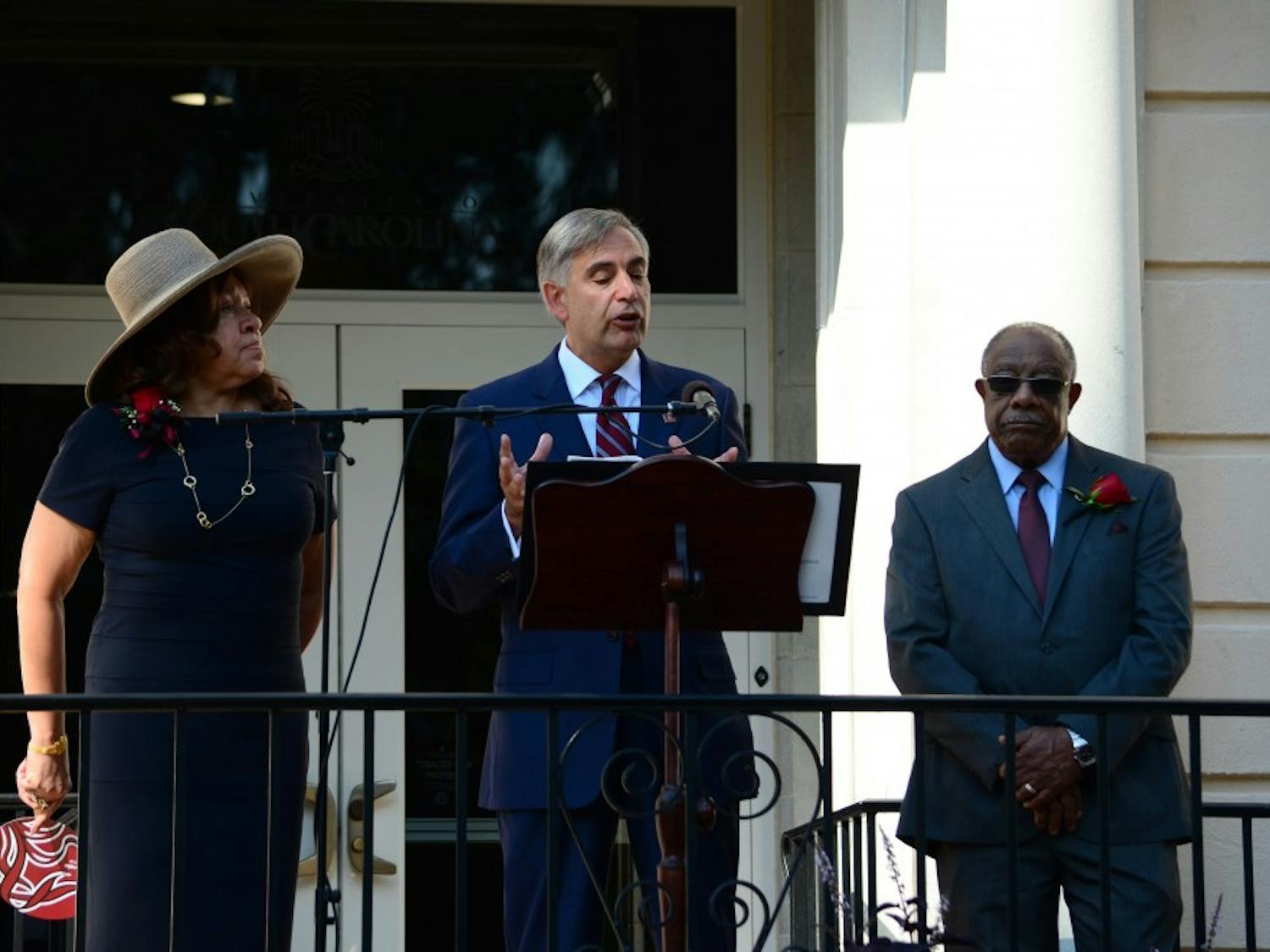 	University President Harris Pastides addresses a large crowd gathered in front of the iconic location at the Osborne Administration Building where Henrie Monteith Treadwell, James Solomon Jr. and Robert Anderson first enrolled at the university.