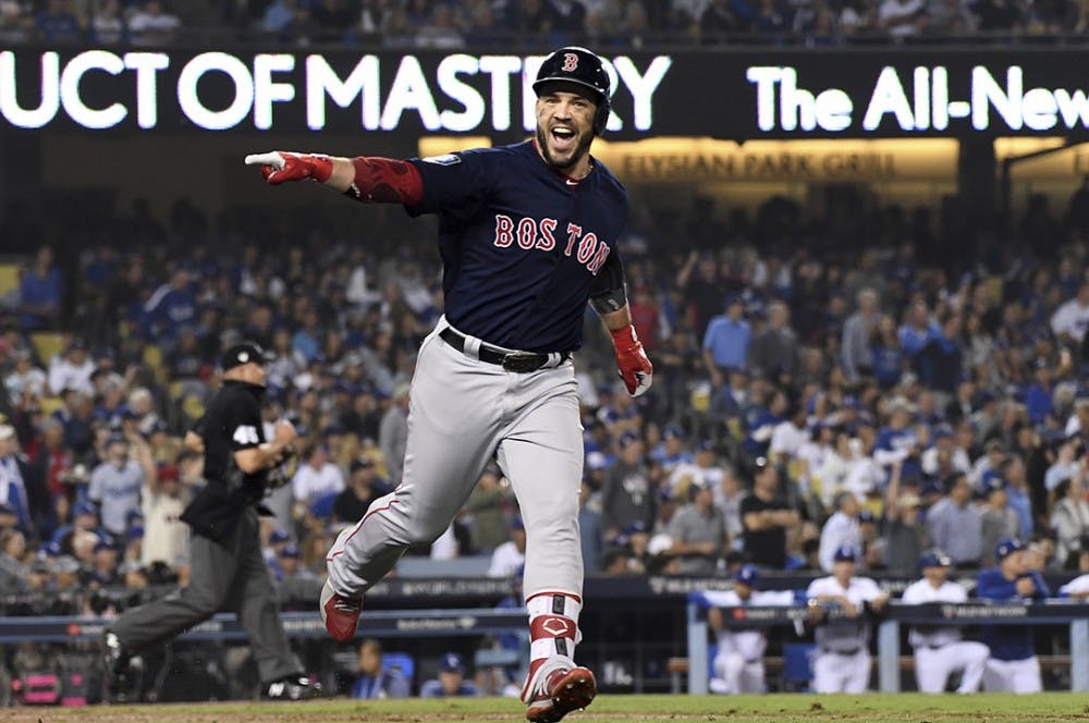 Boston Red Sox&apos;s Steve Pearce celebrates his second home run of the game against the Los Angeles Dodgers in the eighth inning during Game 5 of the World Series on Sunday, Oct. 28, 2018 at Dodger Stadium in Los Angeles, Calif. (Wally Skalij/Los Angeles Times/TNS)