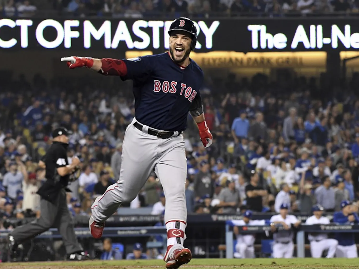 Boston Red Sox's Steve Pearce celebrates his second home run of the game against the Los Angeles Dodgers in the eighth inning during Game 5 of the World Series on Sunday, Oct. 28, 2018 at Dodger Stadium in Los Angeles, Calif. (Wally Skalij/Los Angeles Times/TNS)