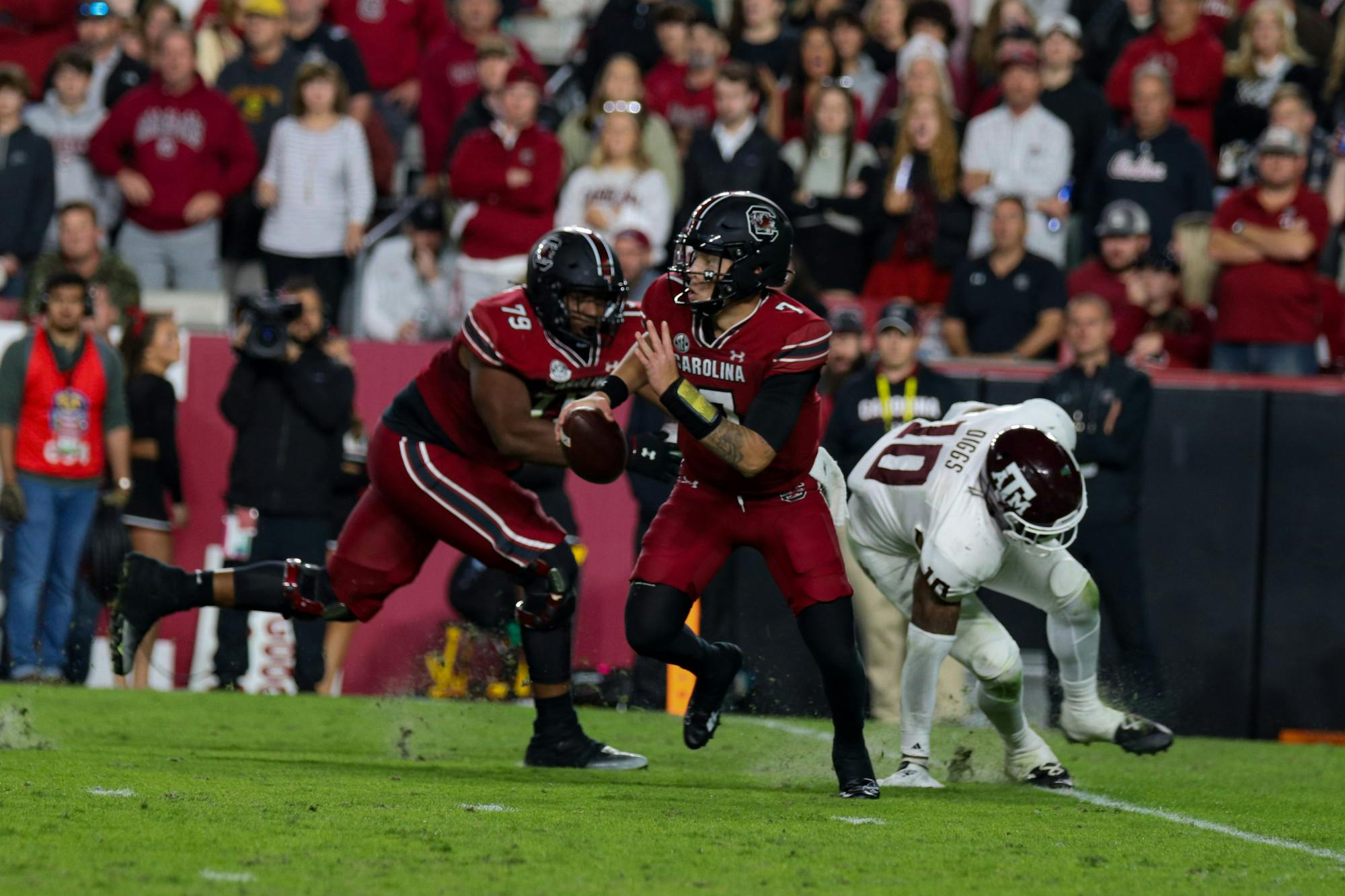 Redshirt junior quarterback Spencer Rattler backs up downfield searching for open receivers during a game against the Texas A&amp;M Aggies at Williams-Brice Stadium on Oct. 22, 2022. &nbsp;South Carolina defeated Texas A&amp;M 30-24.
