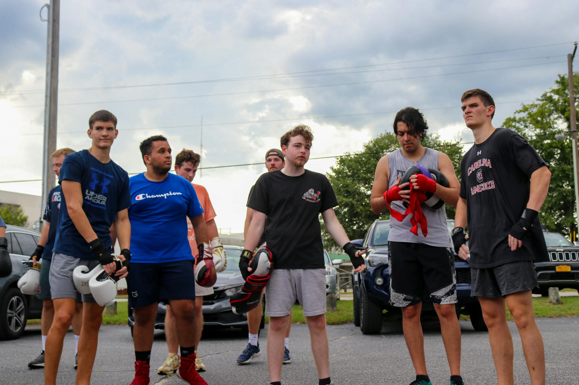 Carolina Boxing Club President Ben McMullen speaks to the club about technique and ring awareness during an afternoon practice on Monday, Sept. 12, 2022, at Battle Boxing Gym in Columbia, S.C. The Carolina Boxing Club practices Monday, Wednesday and Friday afternoons for a variety of training sessions to prepare members for live-sparring sessions and tournaments taking place later this season.
