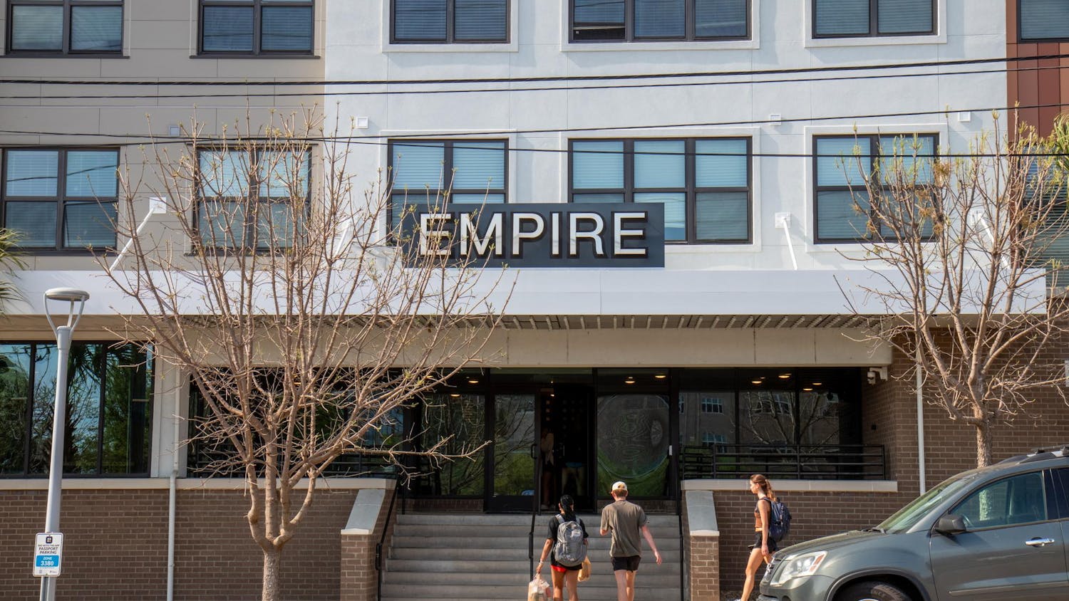 Residents of Empire Columbia enter the lobby of the apartment complex on Apr. 2, 2024. The apartment complex has seven employees on its maintenance staff. According to several residents, Turnaround time for most repairs is a week or less.