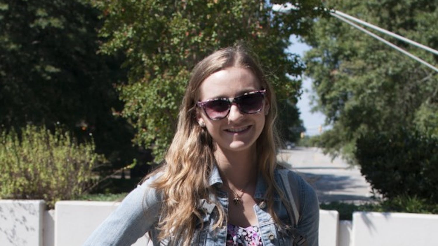 First-year nursing major Nicole Turnipseed rocks cowboy boots from DSW and a dress and jacket from Rue21.