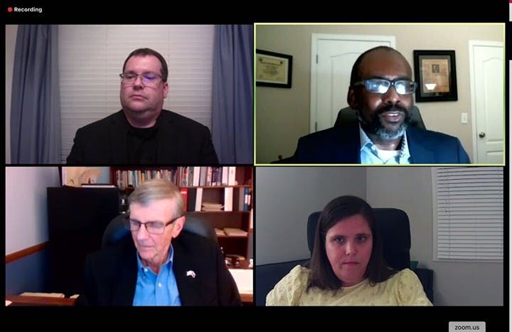 Todd Shaw, an associate political science professor, encourages people that their vote matters (top right). Assistant political science professor Jessica Schoenherr (bottom right) and political science professor Robert Oldendick (bottom left) also gave presentations during the forum. Political science professor Kirk Randazzo (top left) moderated the forum.&nbsp;