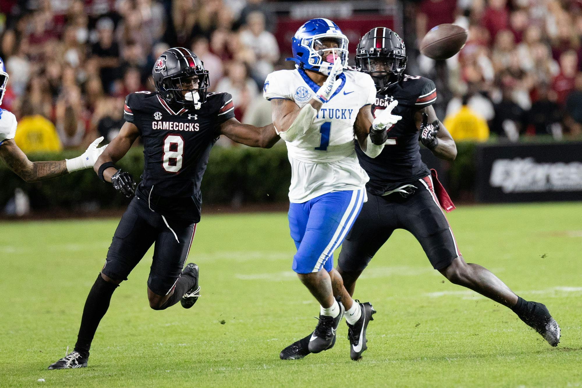 Redshirt freshman defensive back Emory Floyd and redshirt senior linebacker Bam Martin-Scott cover Kentucky running back Ray Davis during a game in Williams-Brice Stadium on Nov. 18, 2023. The Wildcats had 293 total yards compared to the Gamecocks' 257.