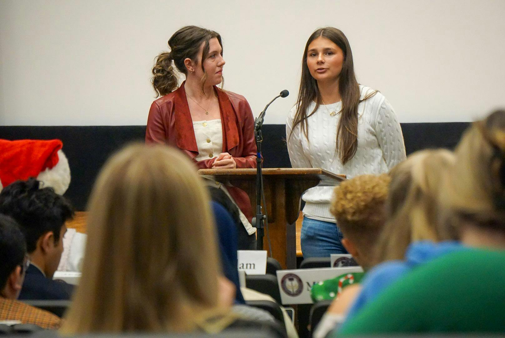 Freshman council representatives report on mutliple committees that relate to the freshman class on Dec. 3, 2025 in the Russell House Auditorium. They met with a University 101 leader to implement a transportation course in the class and will work on adding it by the spring semester.