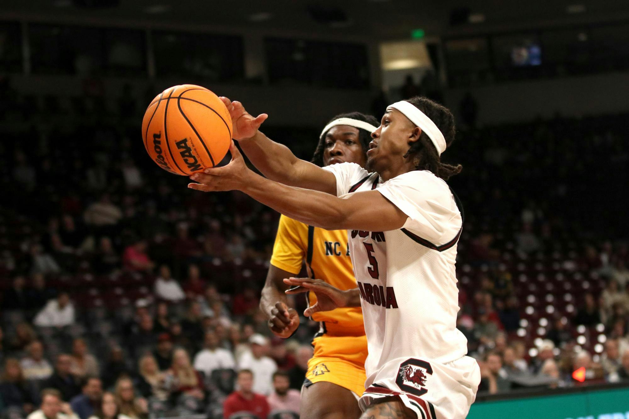 FILE — Redshirt senior guard Meechie Johnson fights for the ball during the game against North Carolina A&amp;T on Nov. 4, 2025. Johnson contributed 14 points to the Gamecocks 91-72 win over the Aggies.