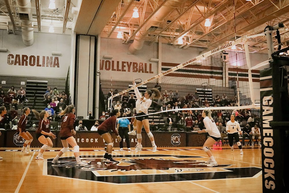 <p>The players block a hit from the Arkansas Razorbacks and score. The Women’s Volleyball team goes on to lose to the Razorbacks in all 3 sets.&nbsp;</p>