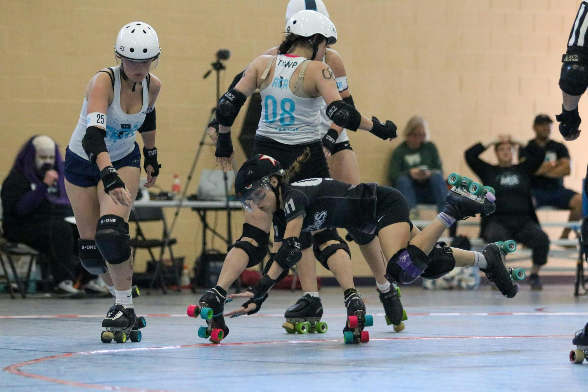 Columbia All Star skater Paityn “Little Bit” Singleton falls after getting hit mid-jump by a Rockin City Rockstar player on March 22, 2026, at St. Andrews Park. “I was really upset about it because they weren’t calling it. I mean, I really don't care anymore. They play dirty,” Singleton said. “But at the end of the day, look at the scoreboard. We won by 100 points.”