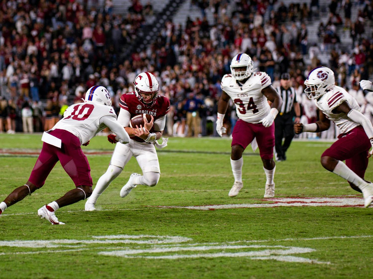 Redshirt junior quarterback Spencer Rattler makes a 6-yard rushing touchdown against S.C. State on Sept. 29, 2022. The Gamecocks defeated S.C. State 50-10.