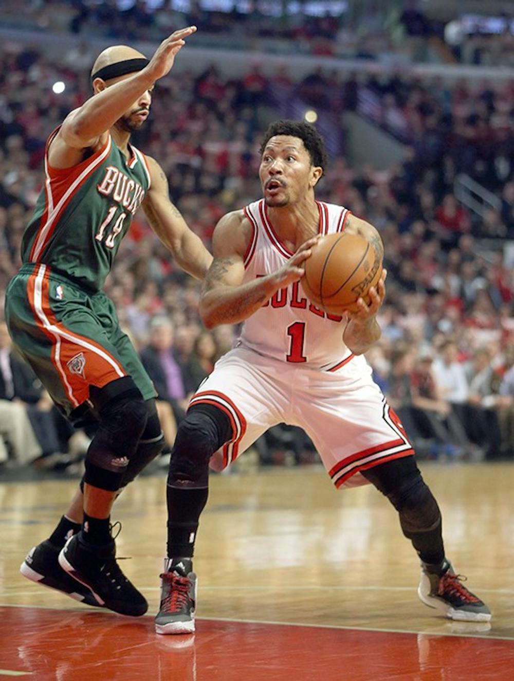 Chicago Bulls guard Derrick Rose (1) drives on Milwaukee Bucks guard Jerryd Bayless (19) during the first half on Monday, April 20, 2015, at the United Center in Chicago. (Brian Cassella/Chicago Tribune/TNS)