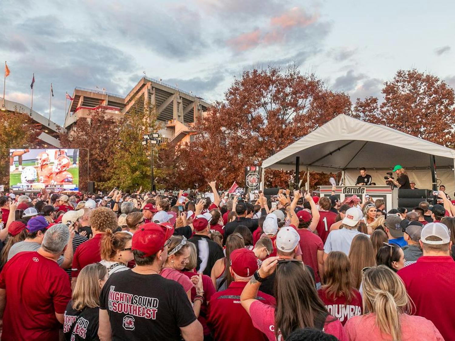 A crowd of Kentucky and South Carolina fans listen to Darude perform "Sandstorm" during his pre-game set at Gamecock Park on Nov. 18, 2023. The Finnish DJ performed several hits from his new album, "Together" and some of his classic hits.