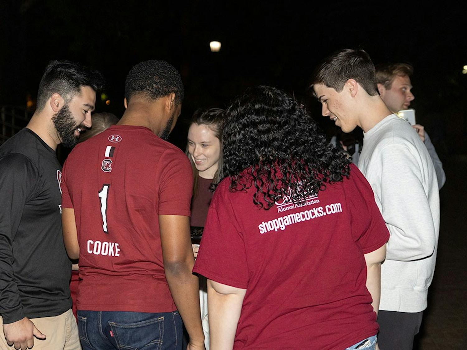 An aquatic sandstorm takes place in Columbia, SC after the women's NCAA championship victory on April 3, 2022. At the end of the fourth quarter, fans stormed the reflection pond and the sandstorm began. 