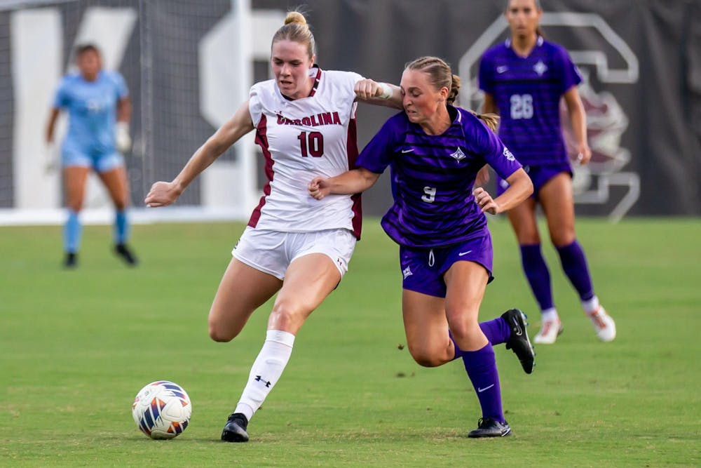 <p>FILE — Fifth year forward Catherine Barry runs the ball up the pitch during South Carolina's match against Furman on Aug. 18, 2024, at Stone Stadium. Barry is one of five players returning to compete in their fifth year for the Gamecocks this season.</p>