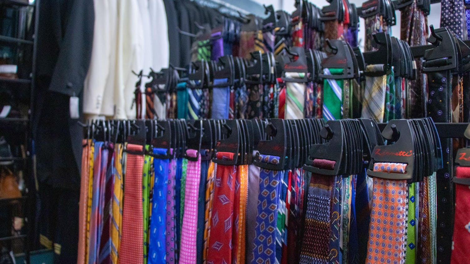 An assortment of ties hang on display inside the Gentleman's Closet consignment shop in Five Points on Jan. 30, 2024. The shop sources many of its ties from other men’s clothing stores that are replacing out-of-season clothes.