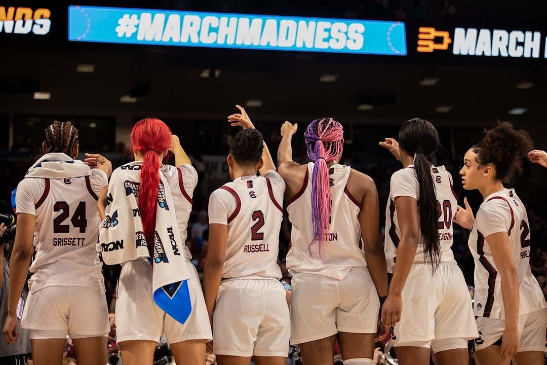FILE— After winning the first round, the gamecock team recites the alma mater together on March 18, 2022, in Colonial Life Arena.