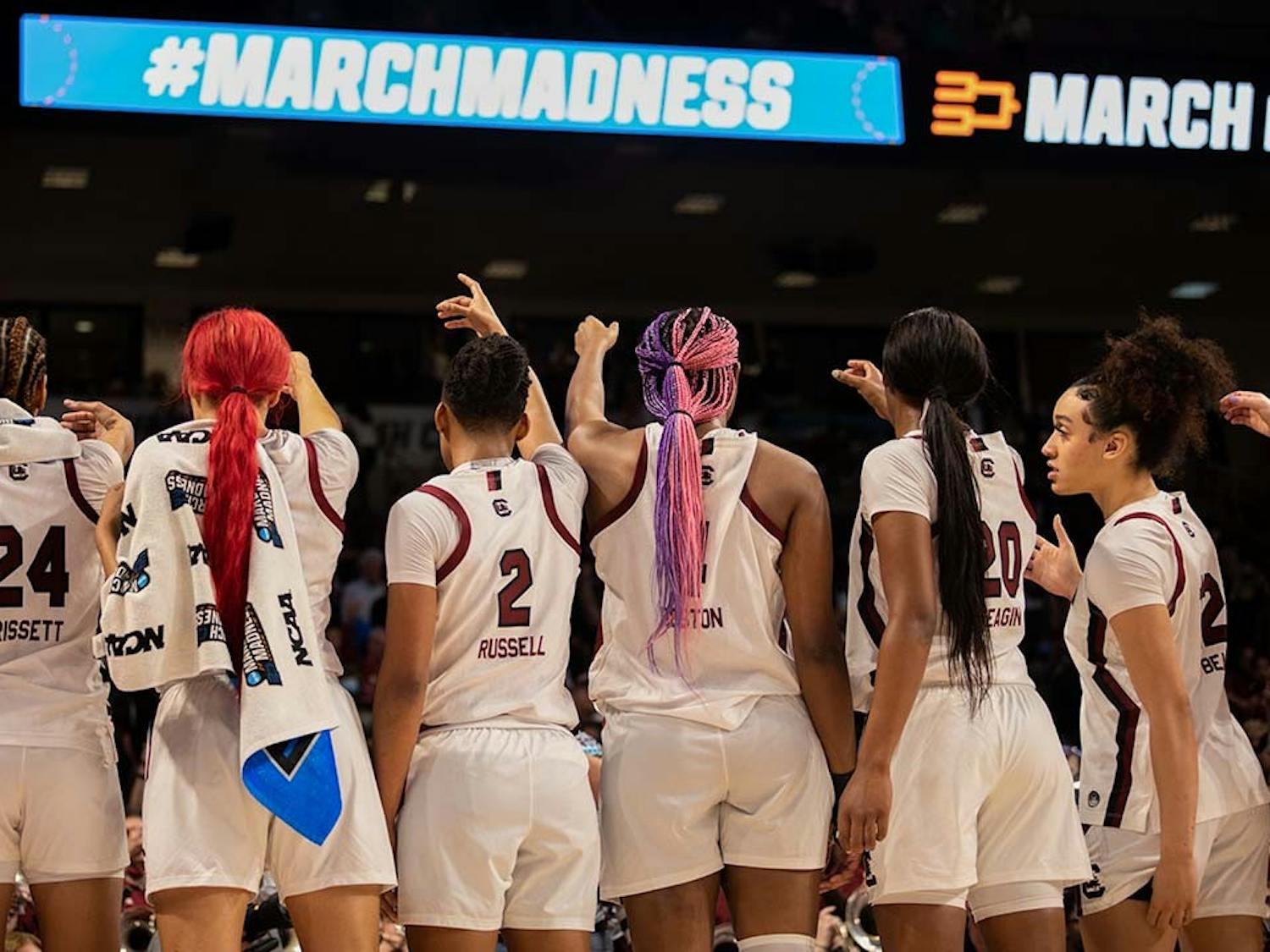 FILE— After winning the first round, the gamecock team recites the alma mater together on March 18, 2022, in Colonial Life Arena.