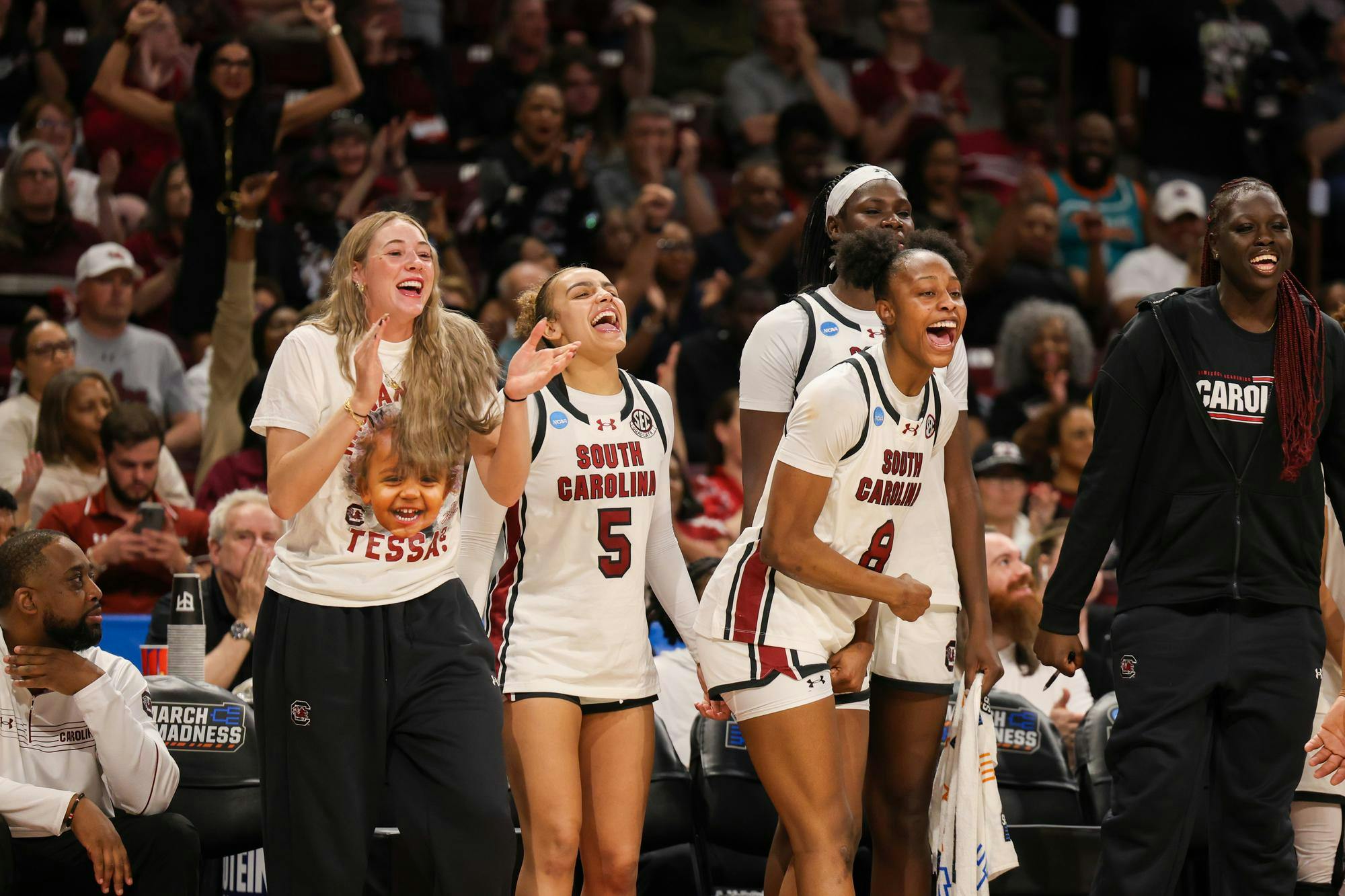 The South Carolina women's basketball team celebrates on the sideline during the March Madness game against USC on March 23, 2026. The Gamecocks defeated the Trojans 101-61.
