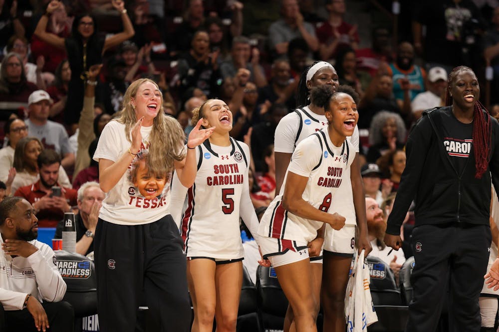 <p>The South Carolina women's basketball team celebrates on the sideline during the March Madness game against USC on March 23, 2026. The Gamecocks defeated the Trojans 101-61.</p>