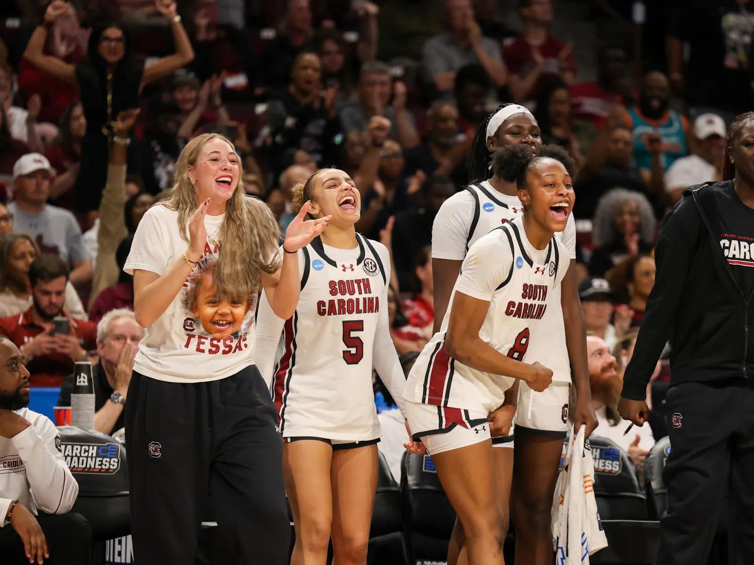 The South Carolina women's basketball team celebrates on the sideline during the March Madness game against USC on March 23, 2026. The Gamecocks defeated the Trojans 101-61.