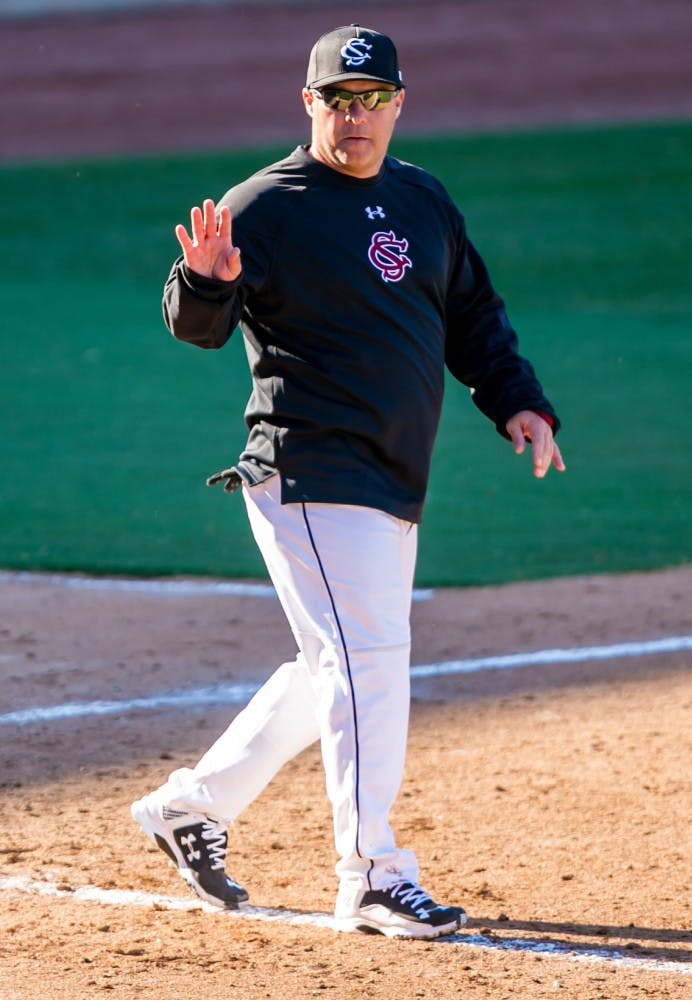 South Carolina head coach Chad Holbrook waves to fans following a 7-1 win against the College of Charleston at Carolina Stadium in Columbia, S.C., on Saturday, Feb. 14, 205. (Jeff Blake/The State/TNS)