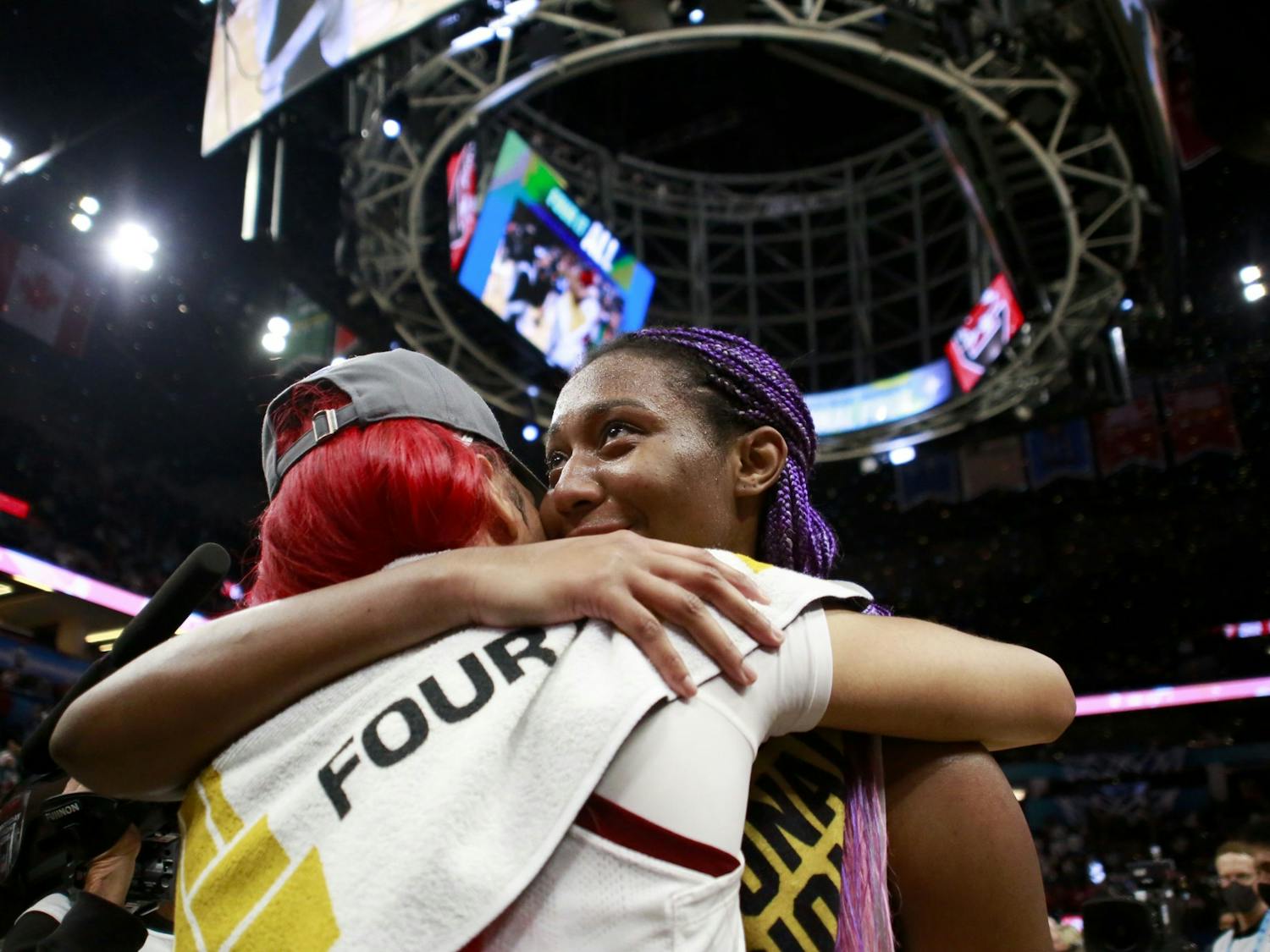 Aliyah Boston and Victaria Saxton share an emotional hug after South Carolina's 64-49 victory over University of Connecticut, winning the 2022 National Championship on April 3, 2022.