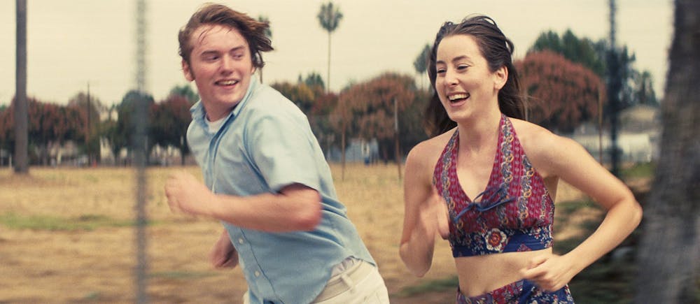 <p>Cooper Hoffman, left, and Alana Haim in the movie "Licorice Pizza."</p>