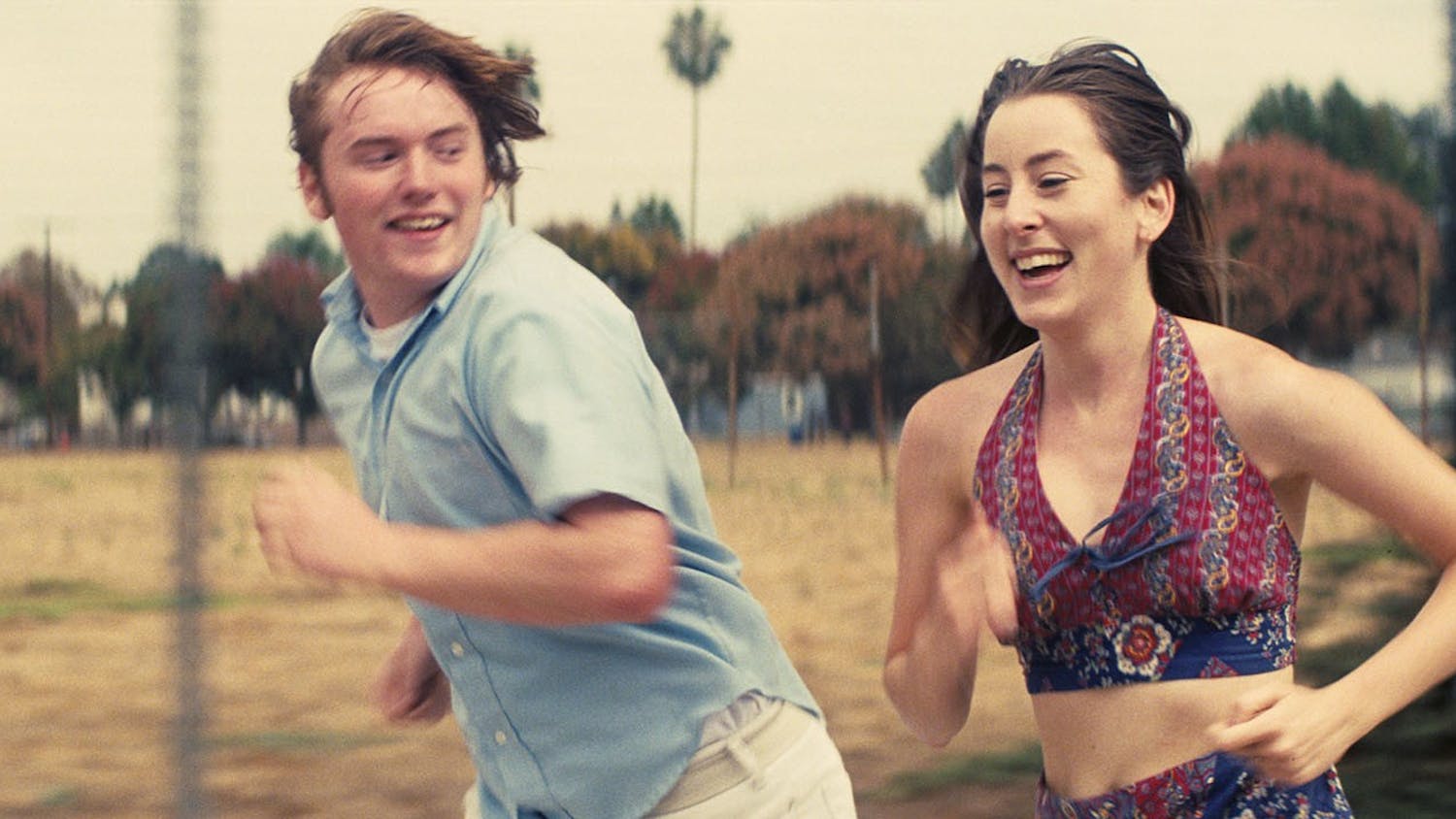 Cooper Hoffman, left, and Alana Haim in the movie "Licorice Pizza."