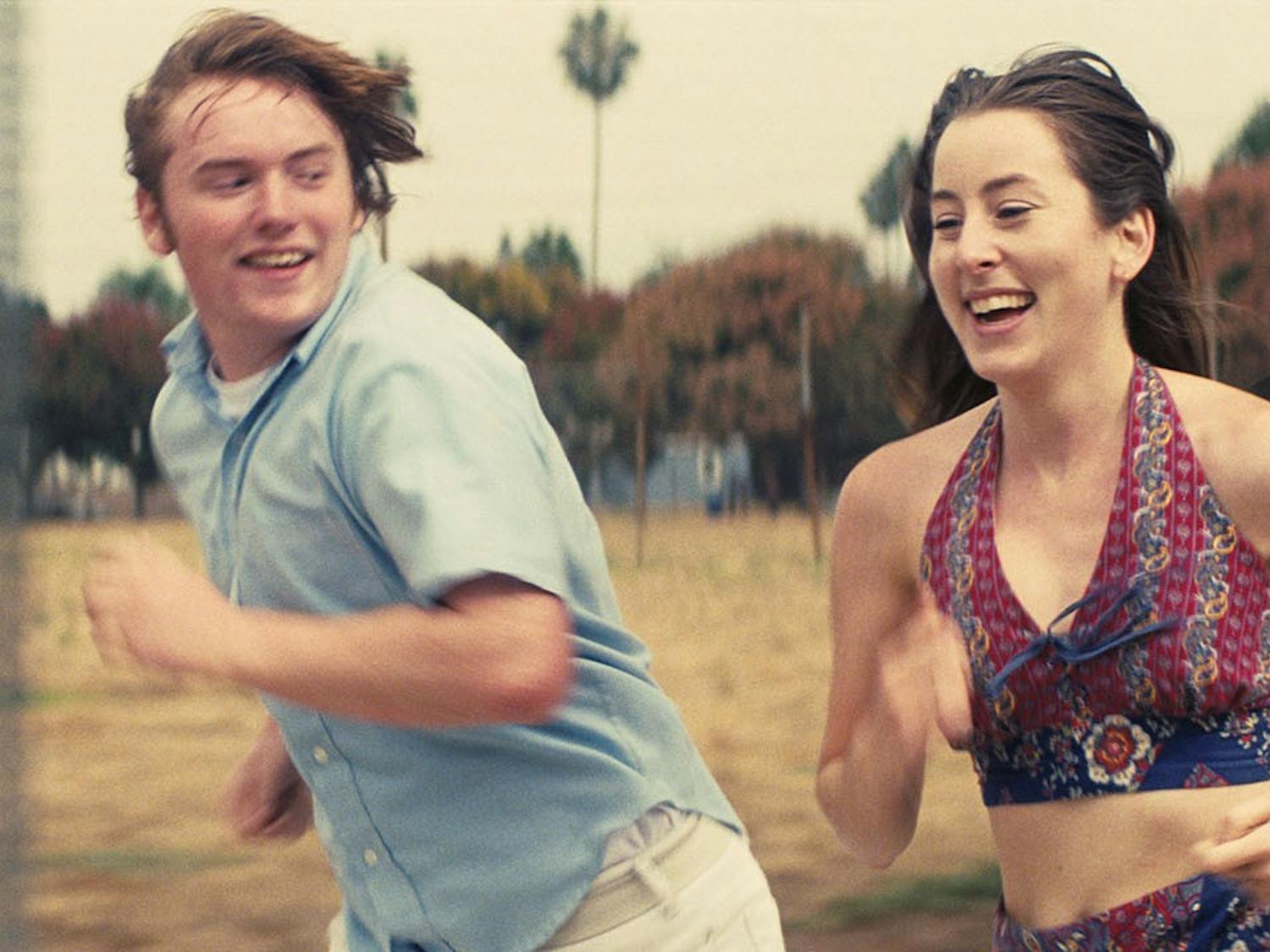 Cooper Hoffman, left, and Alana Haim in the movie "Licorice Pizza."