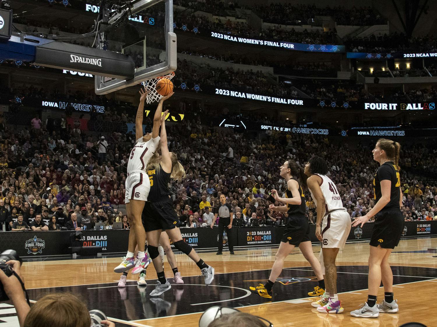 Senior forward Victaria Saxton goes in for a layup while holding off the Iowa Hawkeyes at the Women’s Final Four match on March 31, 2023. The Gamecocks fell to the Hawkeyes 77-73, ending its 42-game winning streak. 