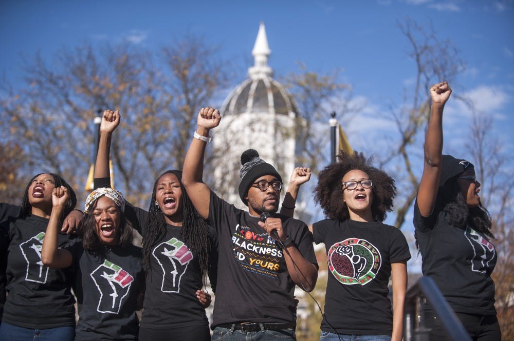 Concerned Students 1950 and the student body chant for solidarity and power at Traditions Plaza during a press conference following the Concerned Students 1950 protest on Monday, Nov. 9 2015, in Columbia, Mo. (Michael Cali/San Diego Union-Tribune/TNS)