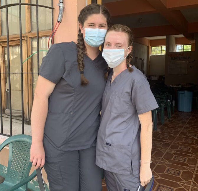 Grace Towery (left) and Moya Shaw (right) pose in Guatemala during their volunteer internship with VAW Global Health Alliances.