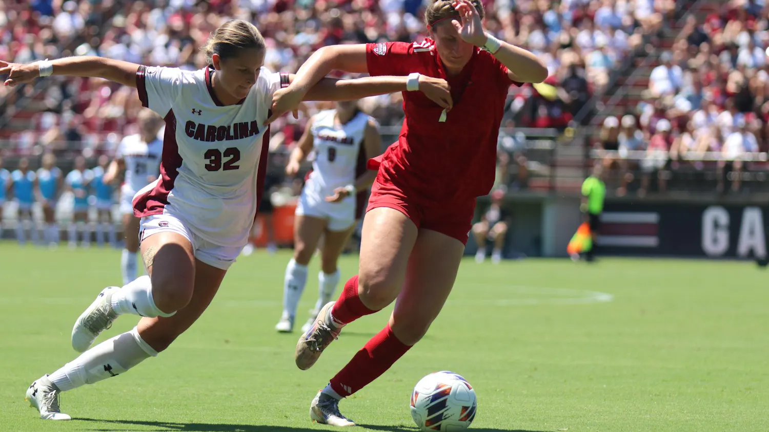 Junior midfielder Cuyler Zulauf attempts to steal a ball against a Miami Ohio player on Aug. 24, 2025 at Stone Stadium. Zulauf attempted a penalty kick, scoring a goal and leading the Gamecocks 2-0 against the Redhawks.