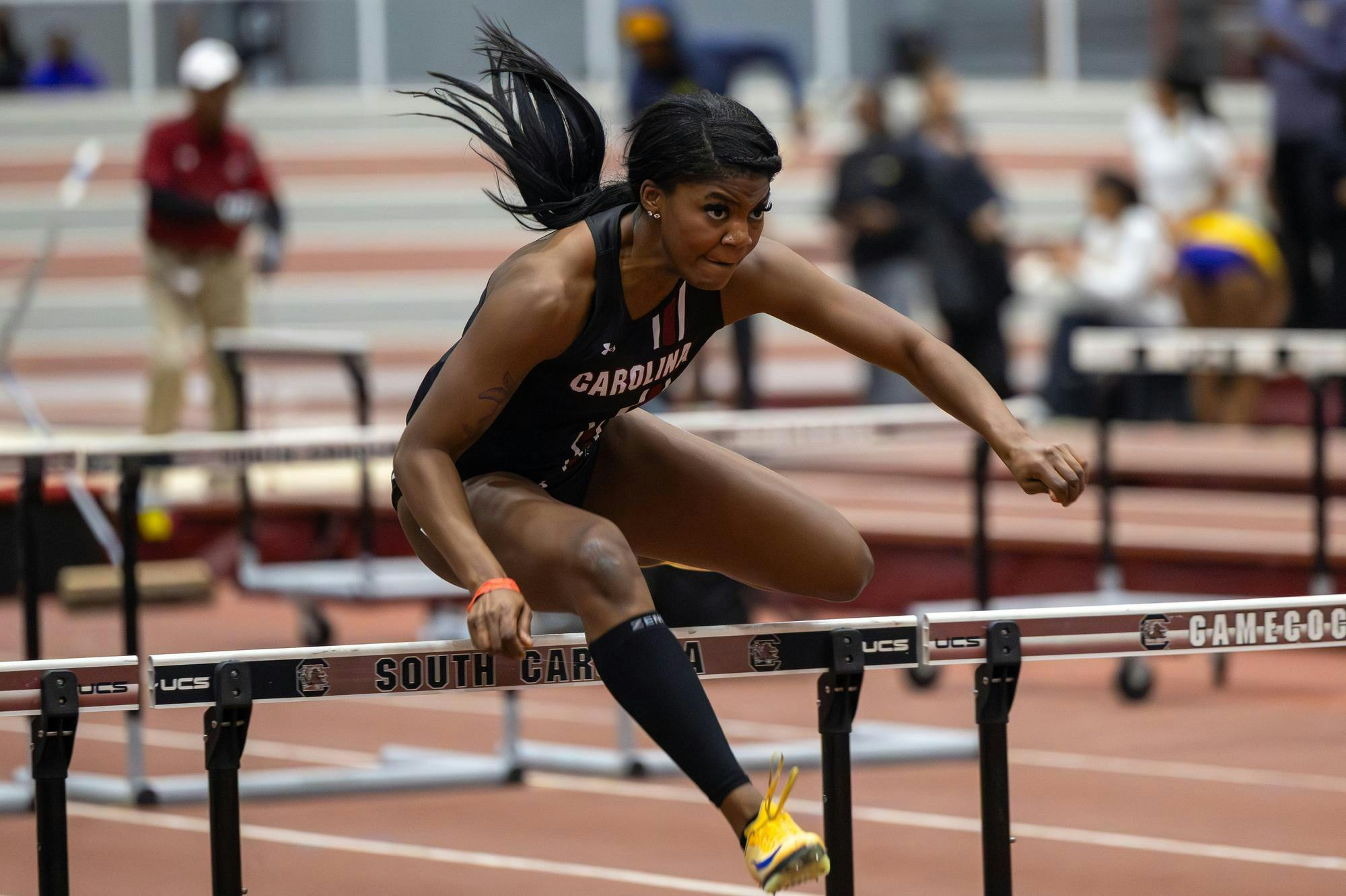 Sophomore sprinter Kennedy Flynn clears a hurdle during the women's 60m hurdles at the Carolina Classic track and field meet on Feb. 6, 2026. Flynn made it to the finals and finished with a time of 8.52 seconds.