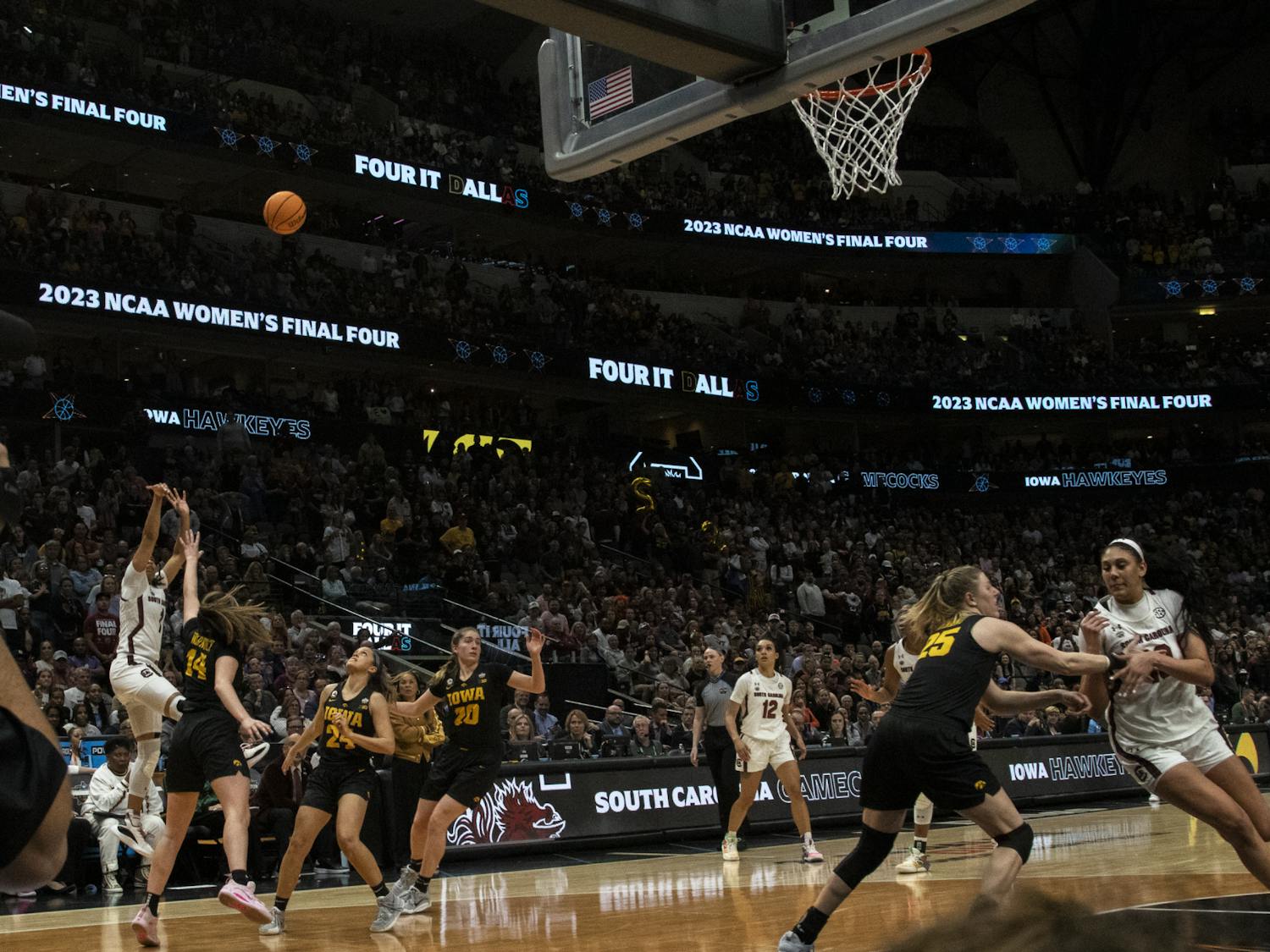 Cooke steps back and attempts a 3-pointer to decrease the score deficit in the Final Four match against the University of Iowa on March 31, 2023. Cooke led her team, making 18 points and five assists in the first half of the game, and was named the Ann Meyers Drysdale Shooting Guard of the Year.