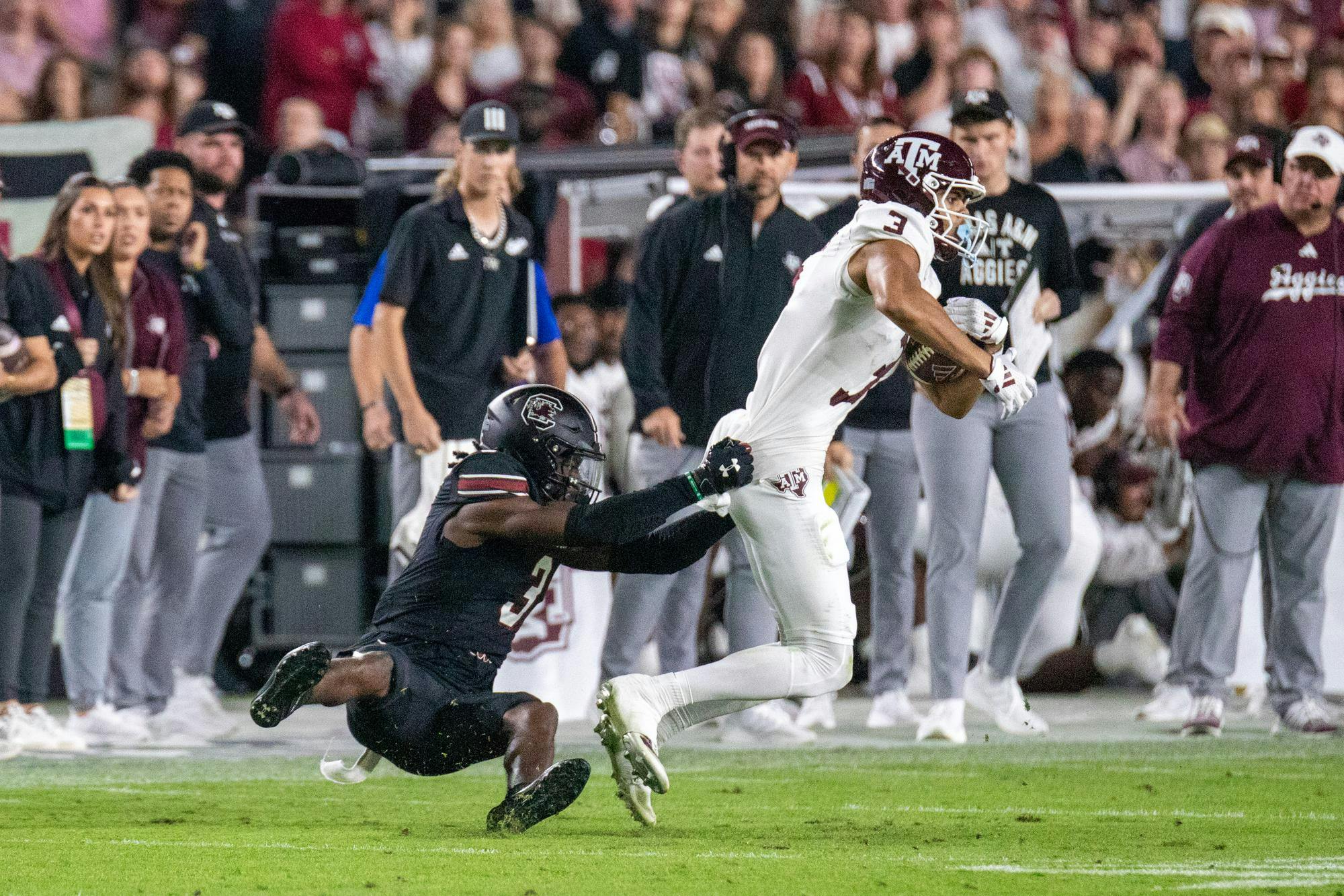 FILE — Redshirt senior defensive back O'Donnell Fortune grabs the jersey of a Texas A&amp;M player in a game on Nov. 2, 2024, at Williams-Brice Stadium. Fortune recorded four solo tackles and one interception against the No. 10 Aggies.