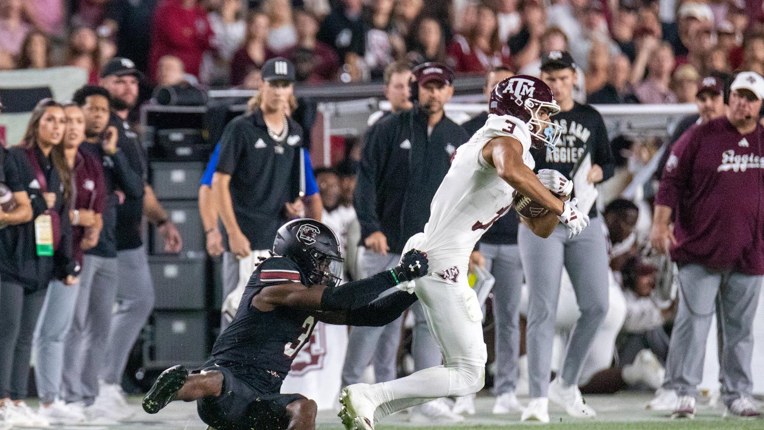 FILE — Redshirt senior defensive back O'Donnell Fortune grabs the jersey of a Texas A&M player in a game on Nov. 2, 2024, at Williams-Brice Stadium. Fortune recorded four solo tackles and one interception against the No. 10 Aggies.