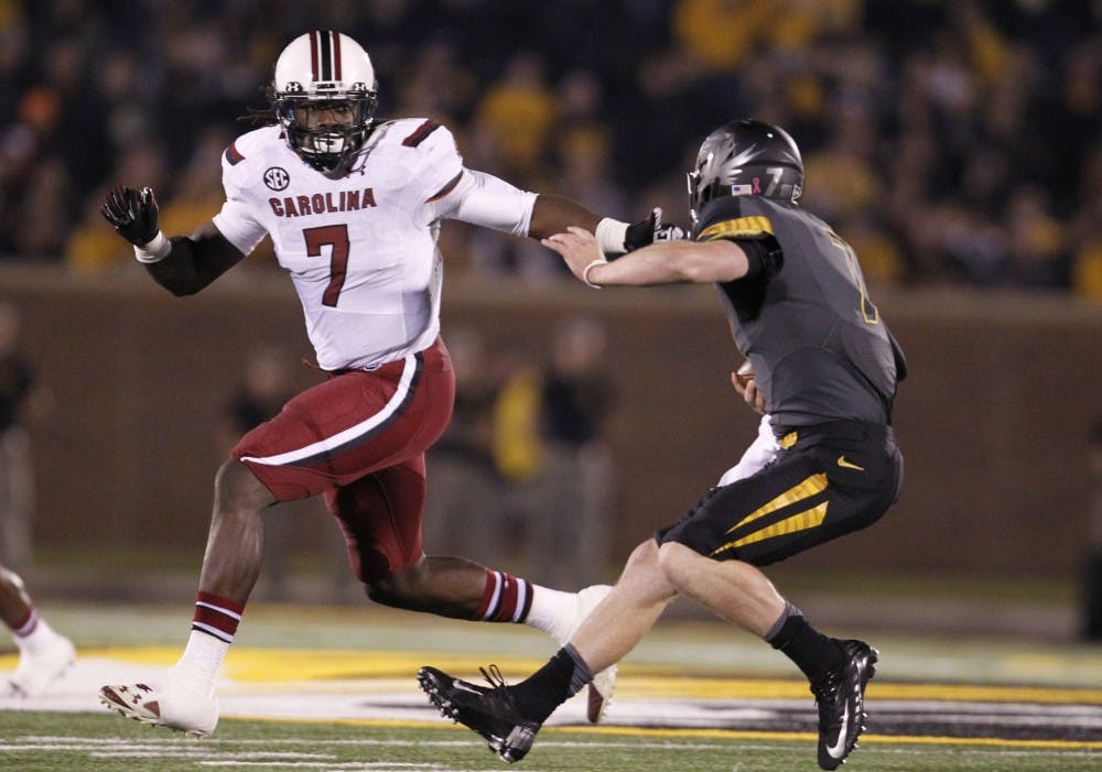 South Carolina Gamecocks defensive end Jadeveon Clowney (7) pressures Missouri Tigers quarterback Maty Mauk (7) in the second quarter at Memorial Stadium's Faurot Field in Columbia, Missouri, on Saturday, October 26, 2013. (Gerry Melendez/The State/MCT)