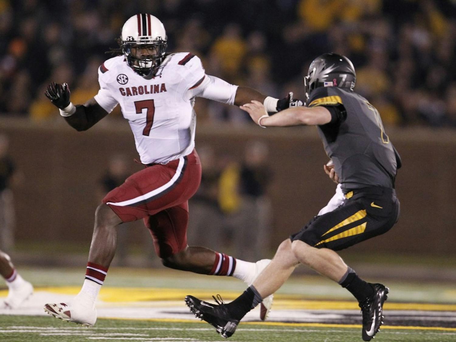 South Carolina Gamecocks defensive end Jadeveon Clowney (7) pressures Missouri Tigers quarterback Maty Mauk (7) in the second quarter at Memorial Stadium's Faurot Field in Columbia, Missouri, on Saturday, October 26, 2013. (Gerry Melendez/The State/MCT)