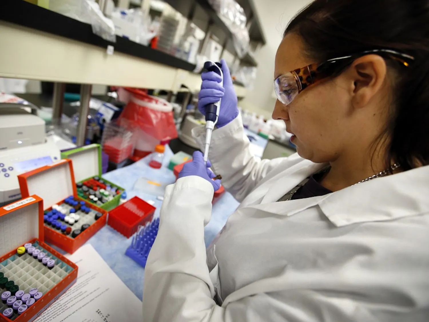 Stephanie Wiltzius, Associate Scientist at Kite Pharma, sets up samples for an experiment at the Santa Monica facility on Sept. 29, 2015. (Al Seib/Los Angeles Times/TNS)