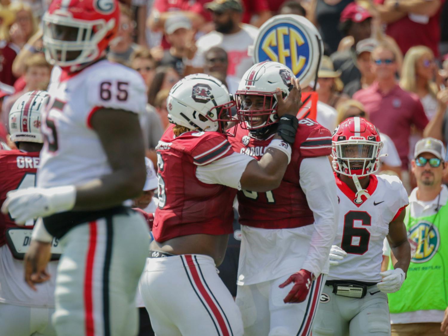 FILE — Gamecock football players celebrate with their teammates at Williams-Brice Stadium against the University of Georgia on Sep. 17, 2022. The Gamecocks lost to the Bulldogs 48 - 7.