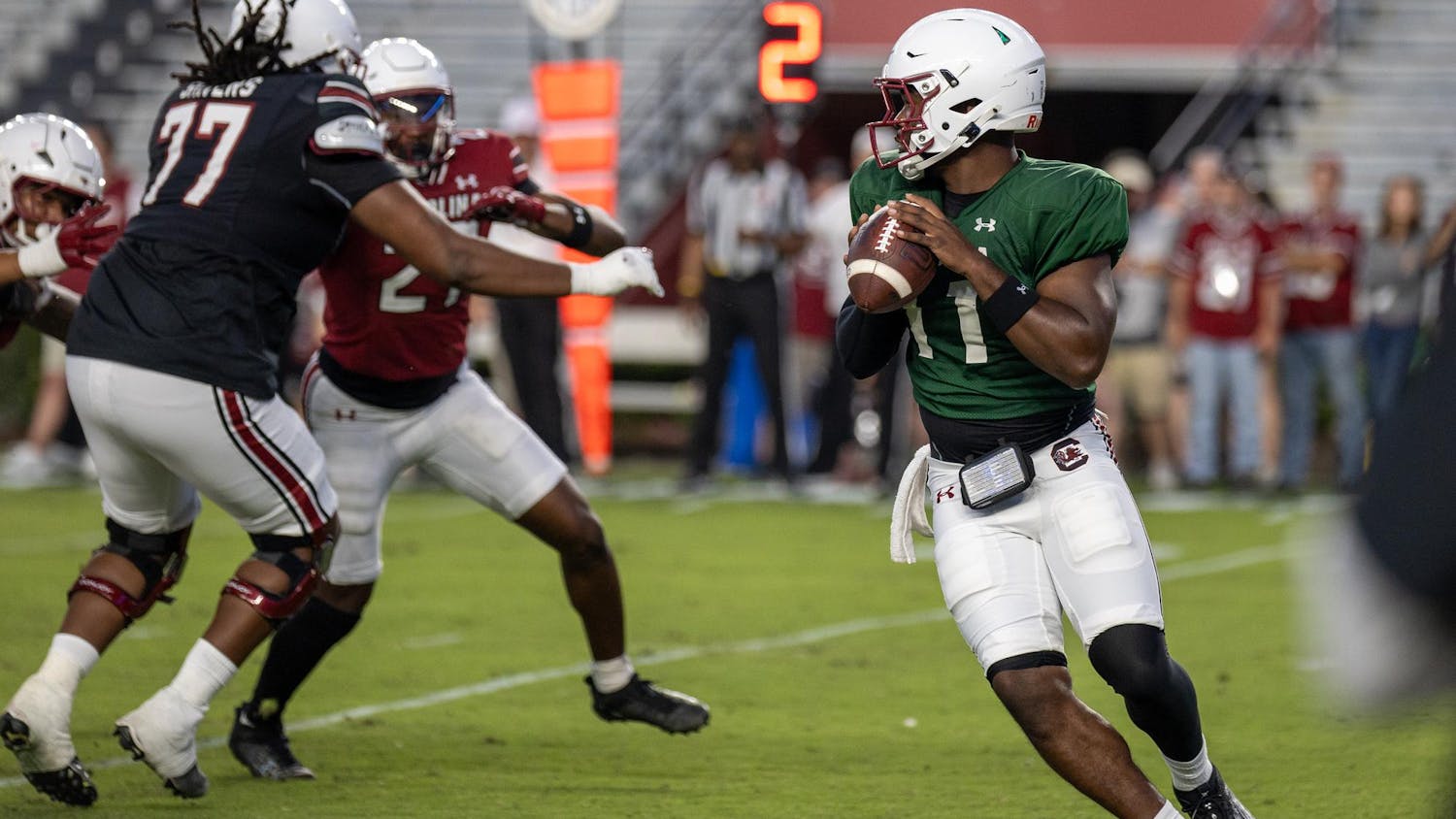 FILE — Redshirt freshman quarterback Air Noland looks for a receiver down field during the football spring game on April 18, 2025 at Williams-Brice Stadium. Noland passed for 67 yards for Team Black, playing alongside other quarterbacks LaNorris Sellers and Cutter Woods.