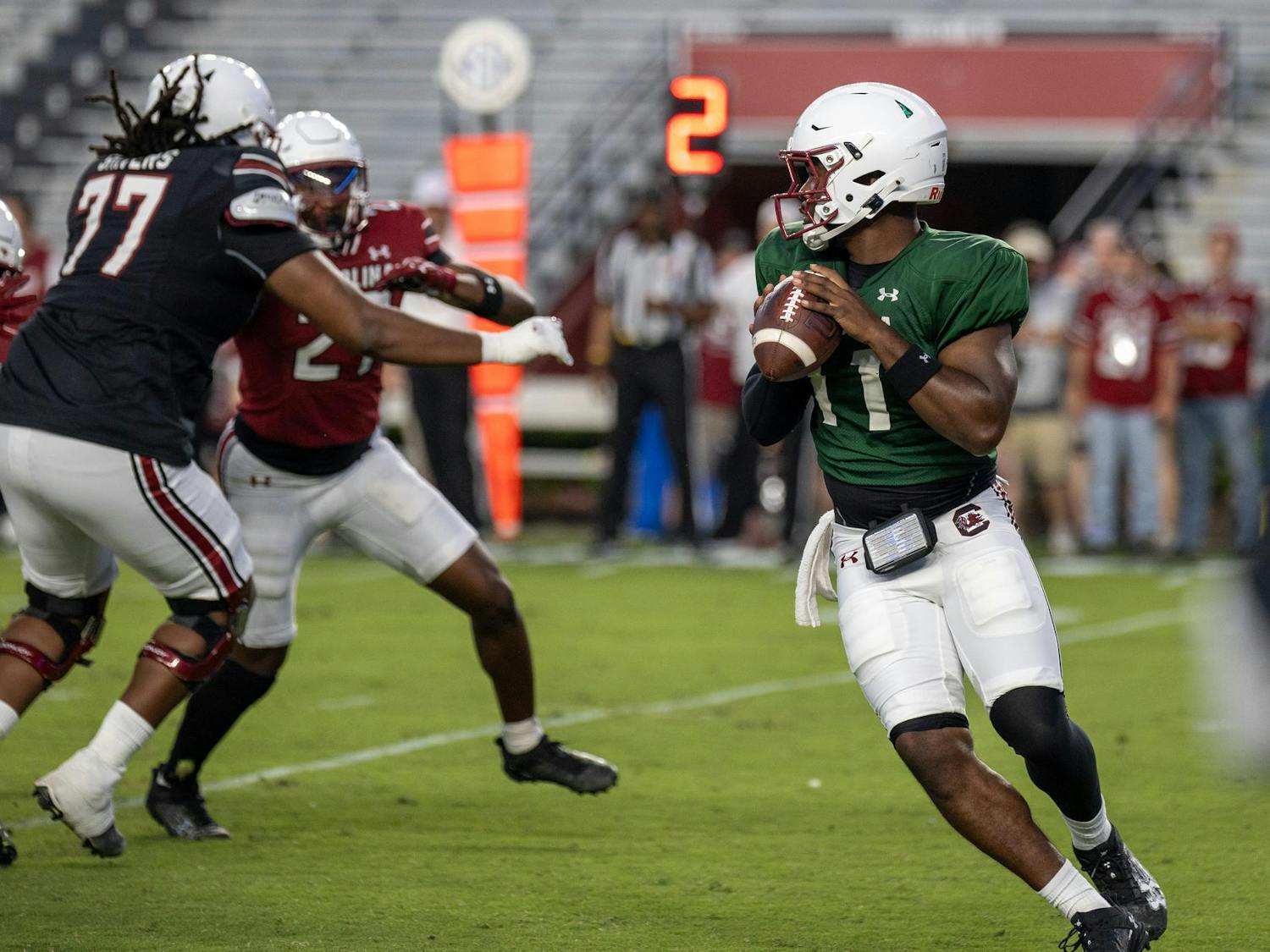 FILE — Redshirt freshman quarterback Air Noland looks for a receiver down field during the football spring game on April 18, 2025 at Williams-Brice Stadium. Noland passed for 67 yards for Team Black, playing alongside other quarterbacks LaNorris Sellers and Cutter Woods.