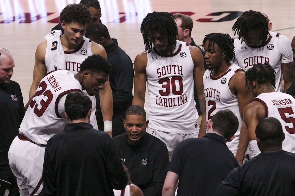 <p>FILE — Head men's basketball coach Lamont Paris pulls his players in for a timeout with 2.3 seconds left on the clock with the team down by 2 points on Feb. 4, 2023. The Gamecocks fell short and lost to the Razorbacks 65-63 after a hard-fought comeback.</p>