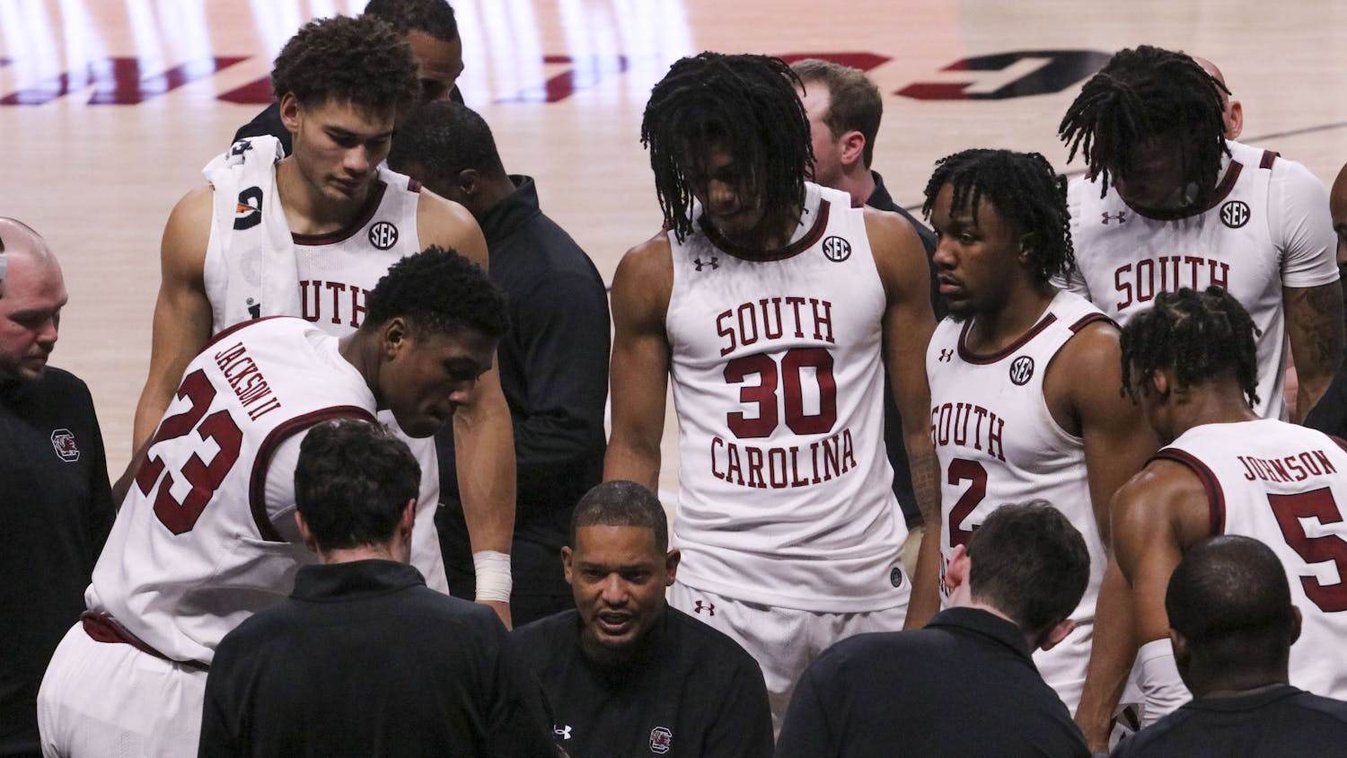 FILE — Head men's basketball coach Lamont Paris pulls his players in for a timeout with 2.3 seconds left on the clock with the team down by 2 points on Feb. 4, 2023. The Gamecocks fell short and lost to the Razorbacks 65-63 after a hard-fought comeback.