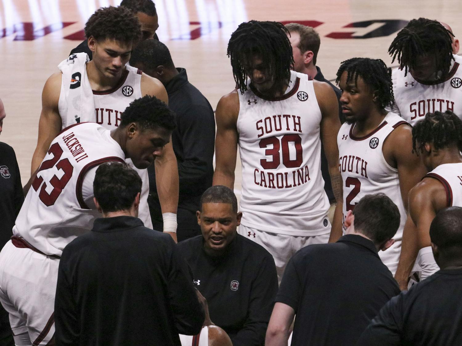 FILE — Head men's basketball coach Lamont Paris pulls his players in for a timeout with 2.3 seconds left on the clock with the team down by 2 points on Feb. 4, 2023. The Gamecocks fell short and lost to the Razorbacks 65-63 after a hard-fought comeback.